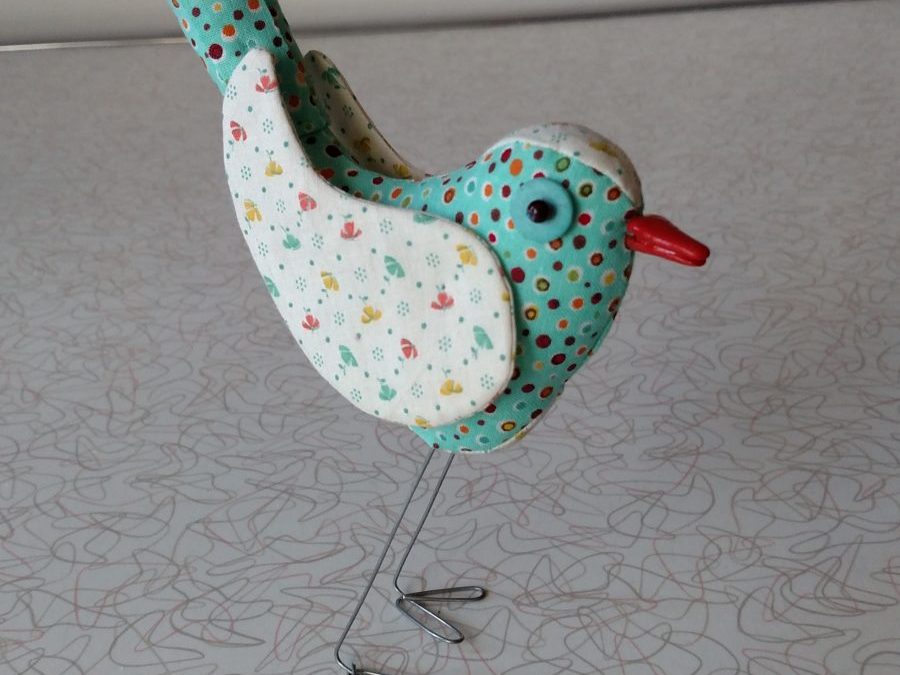Turquoise Speckled Bird